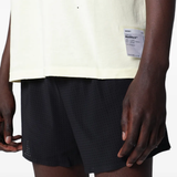 Yellow t-shirt worn by a person, showing the t-shirt fit