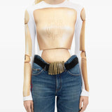 Tan top worn by a person, showing the top fit
