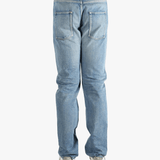 Blue jean worn by a person, showing the fit