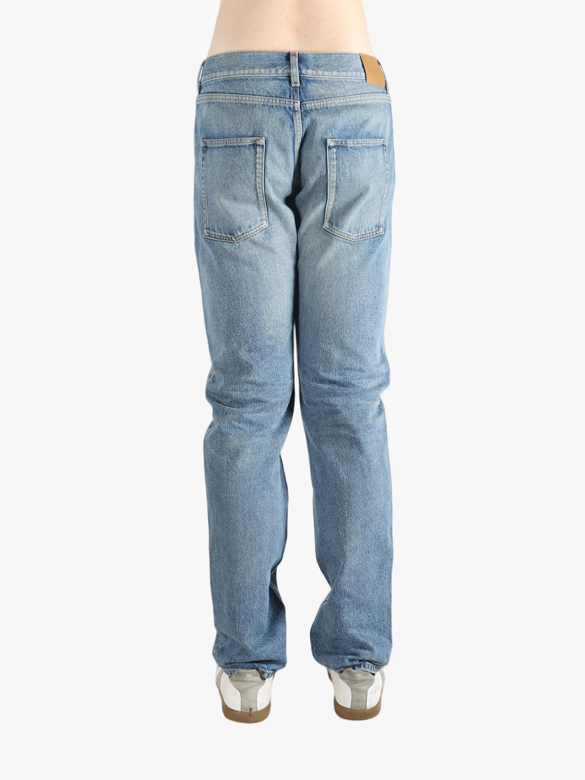 Blue jean worn by a person, showing the fit