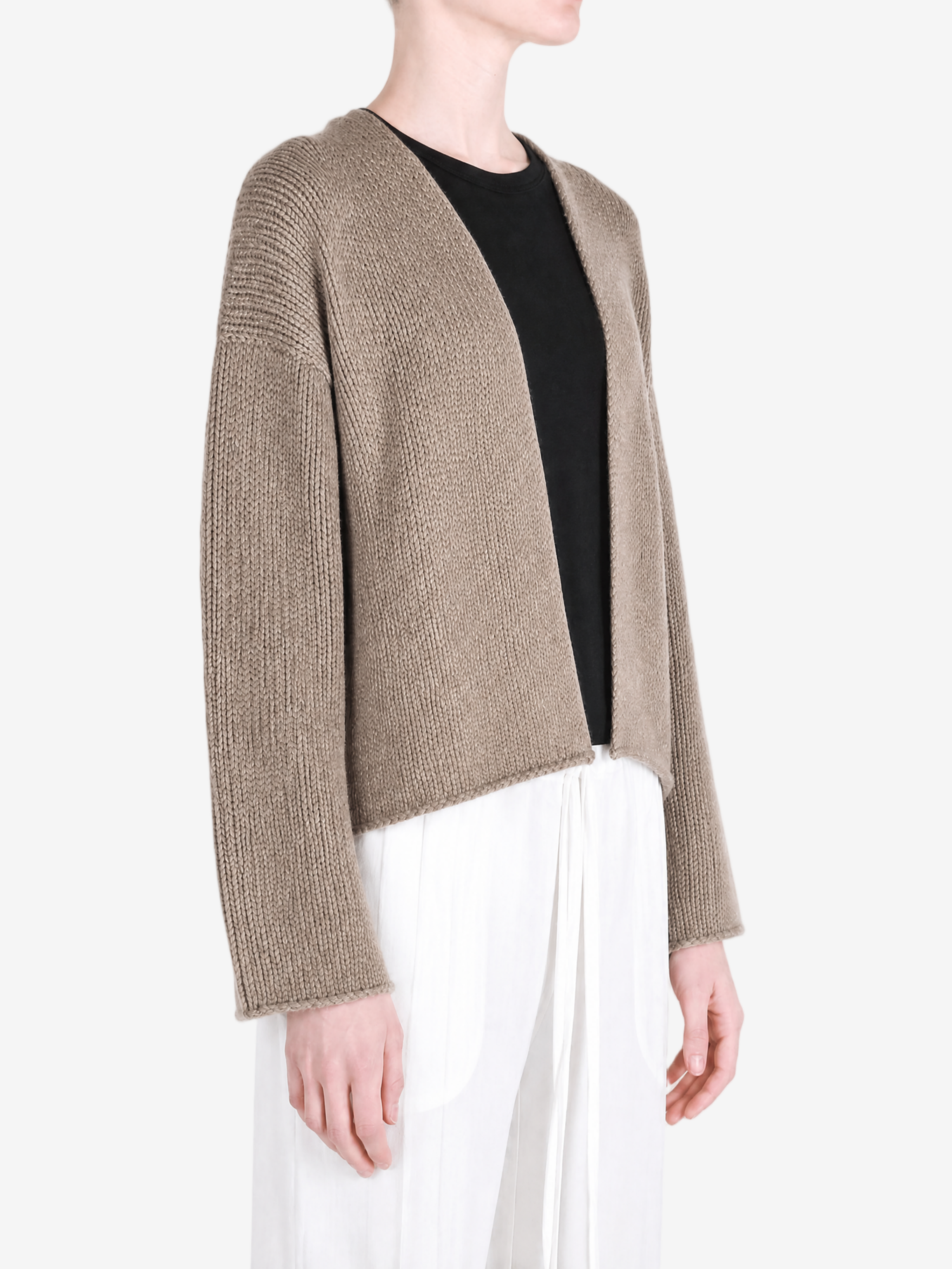 Tan jacket worn by a person, showing the jacket fit