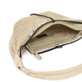 Close up of tan bags, showing texture of the lamb skin fabric