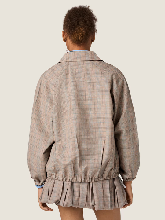Tan jacket, full body view