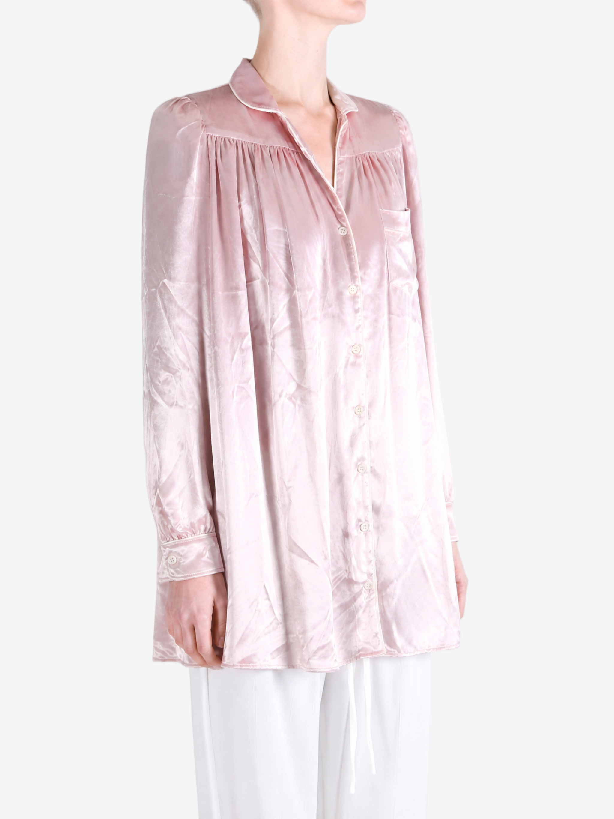 Pink dress worn by a person, showing the dress fit
