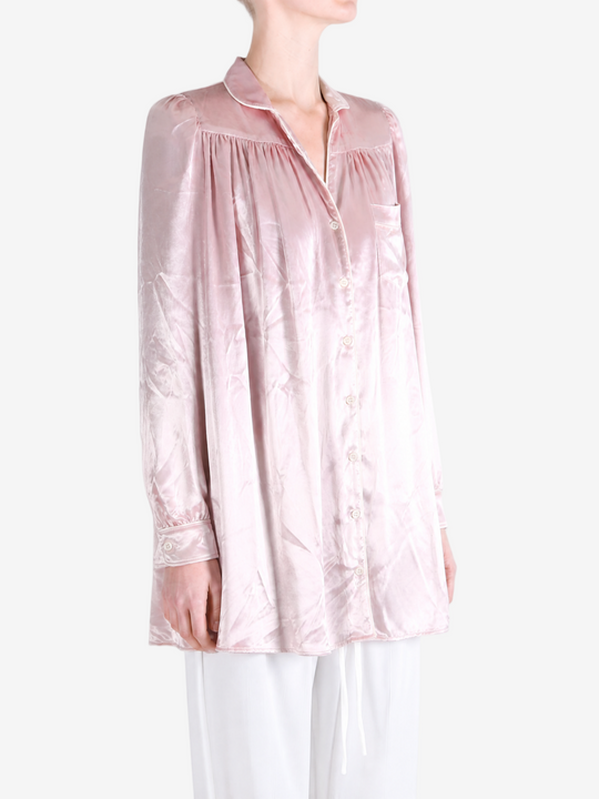 Pink dress worn by a person, showing the dress fit