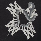 Close up of black t-shirt, showing texture of the cotton fabric