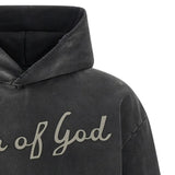 Close up of Black hoodie, showing texture of the 100% cotton fabric