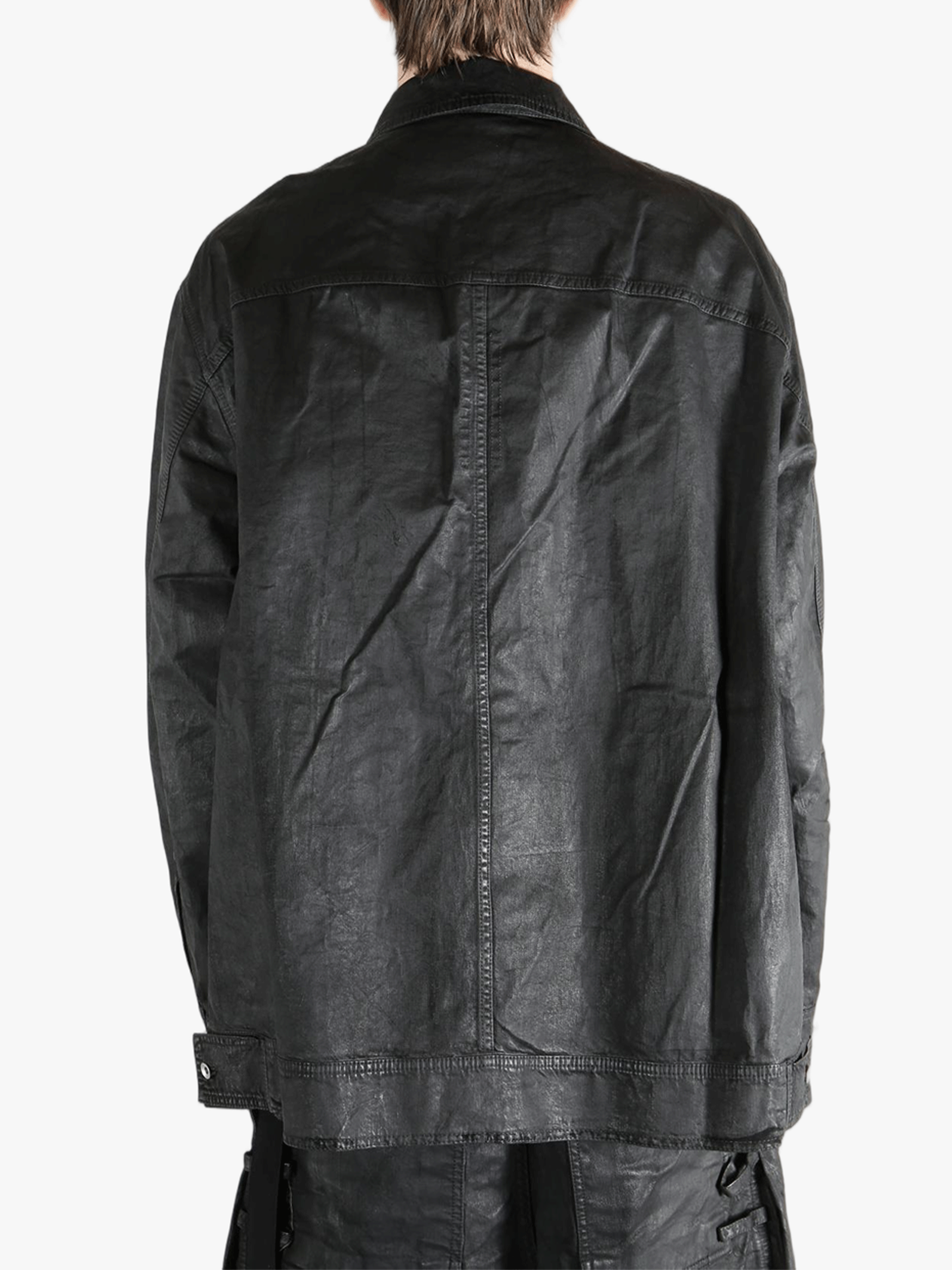 Black jackets-coats worn by a person, showing the fit