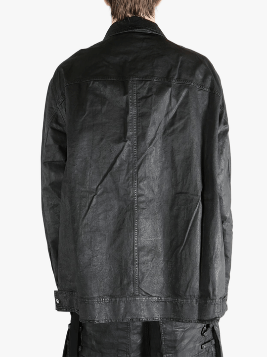 Black jackets-coats worn by a person, showing the fit