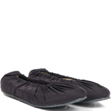 black sneakers ,side view