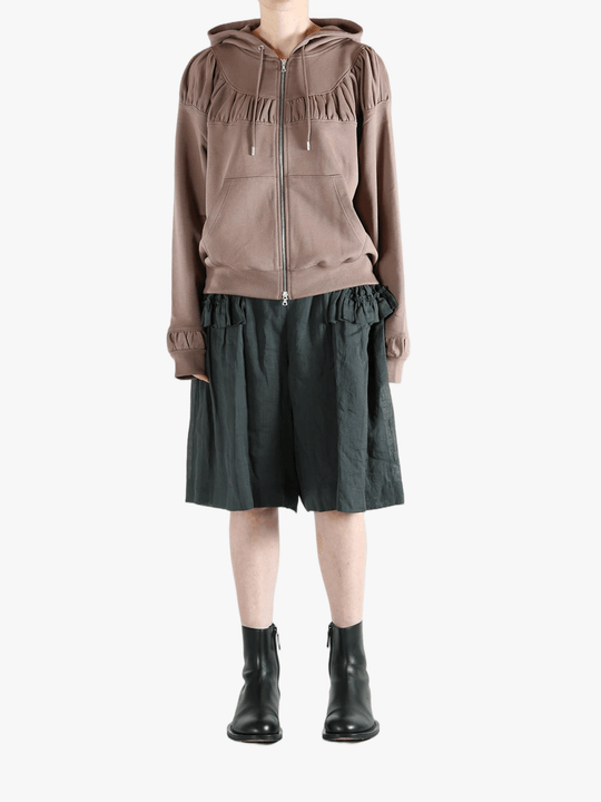 Tan hoodies, full body view