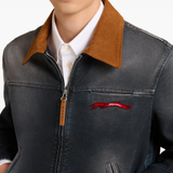 Close up of black jacket, showing texture of the Cotton fabric