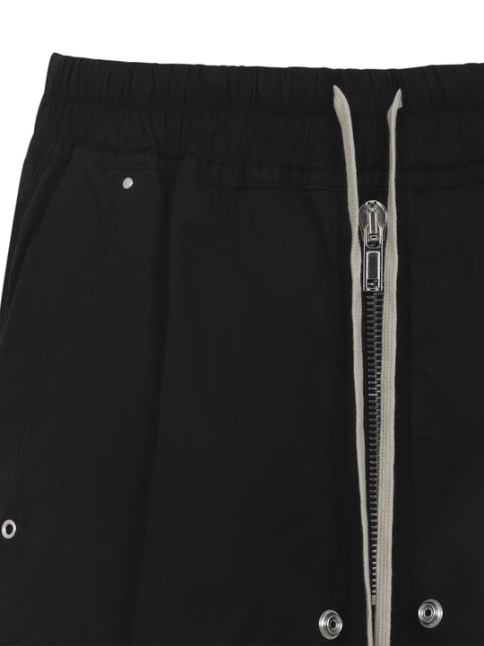 Close up of black pant, showing texture of the cotton fabric