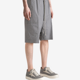 Grey shorts, full body view