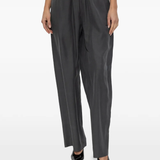 Black pant worn by a person, showing the pant fit