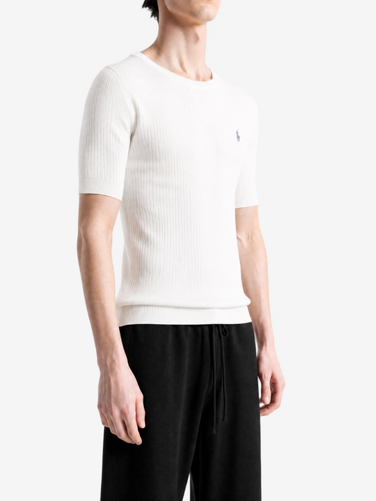 White hoodie worn by a person, showing the hoodie fit