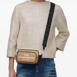 Tan bags, full body view