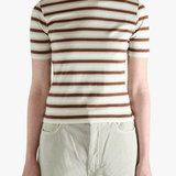 Brown t-shirt worn by a person, showing the t-shirt's fit