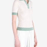 Tan shirt worn by a person, showing the shirt fit