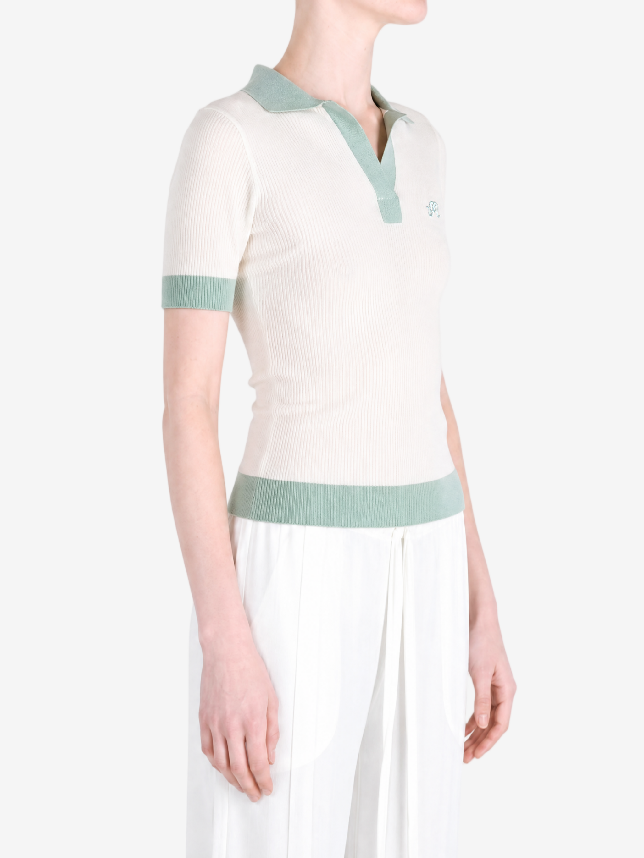Tan shirt worn by a person, showing the shirt fit
