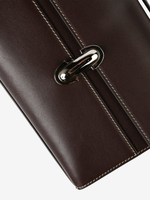 Close up of brown bag, showing the bag's twist-lock