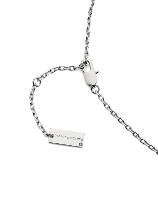 Close up of Grey jewelry, showing detail