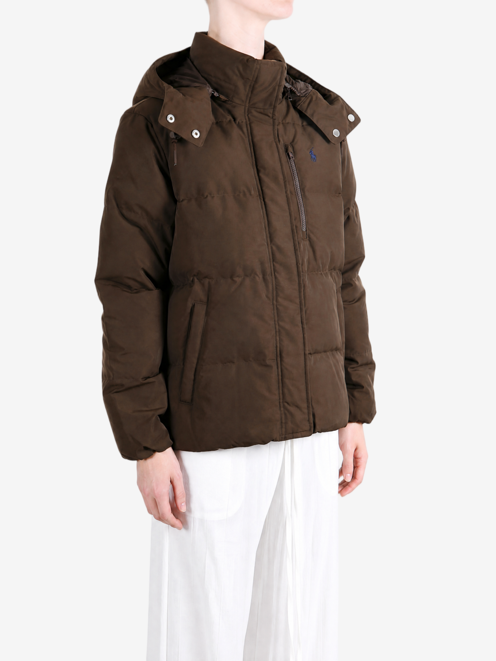 Brown jacket worn by a person, showing the jacket fit