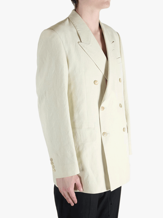 White jackets worn by a person, showing the jackets fit