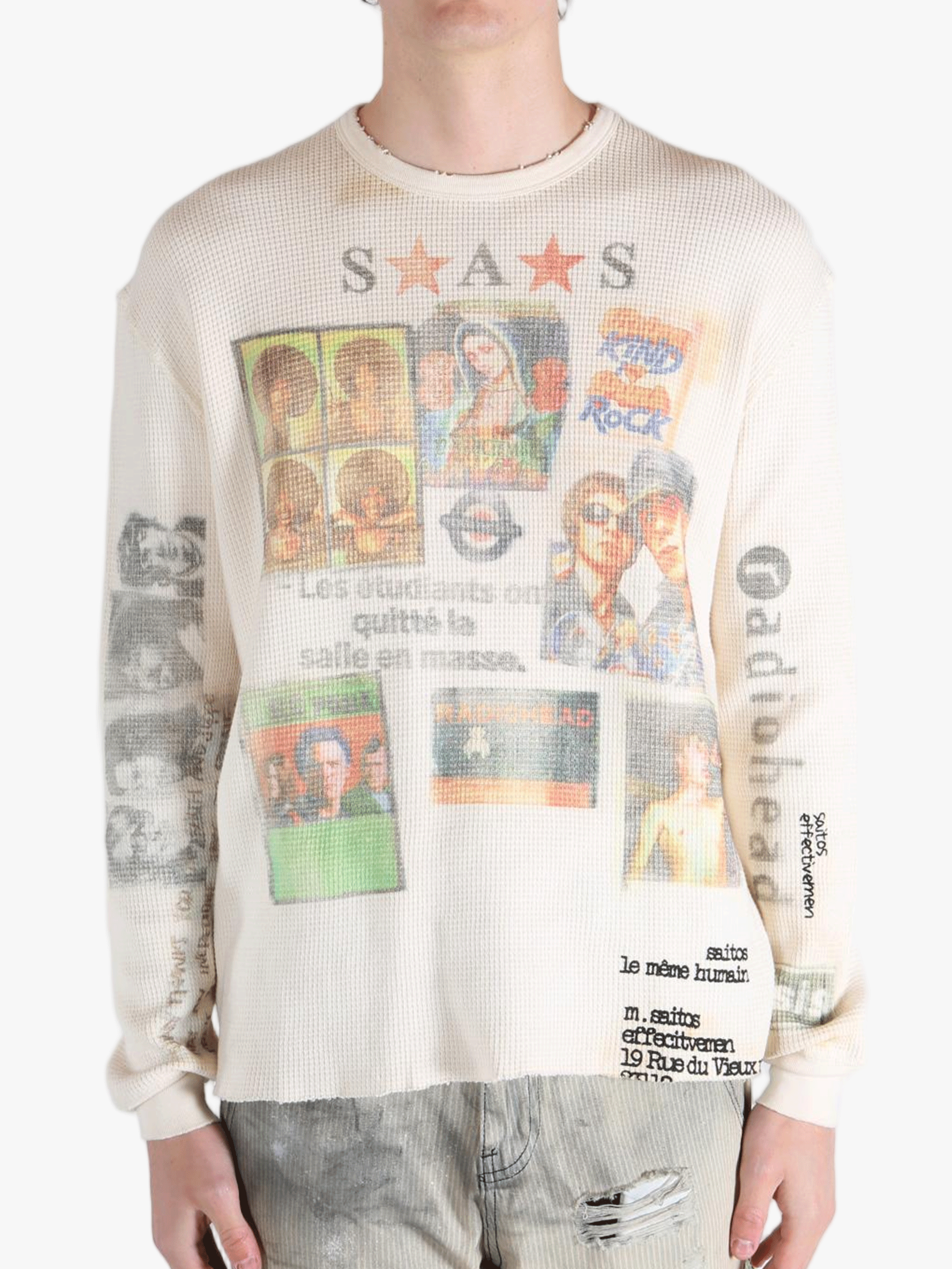 White knitwear worn by a person, showing the knitwear fit