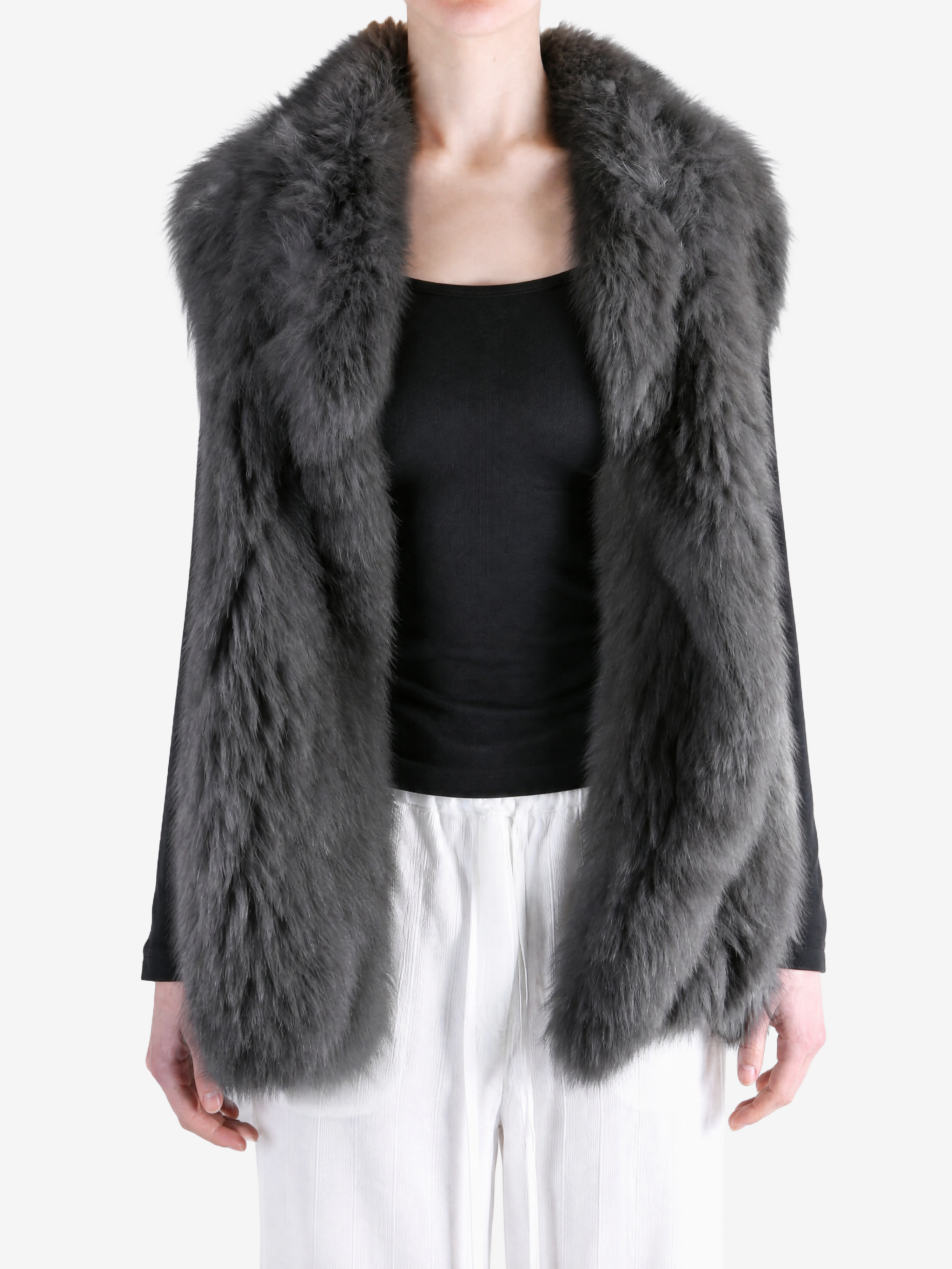 Grey jacket worn by a person, showing the jacket fit
