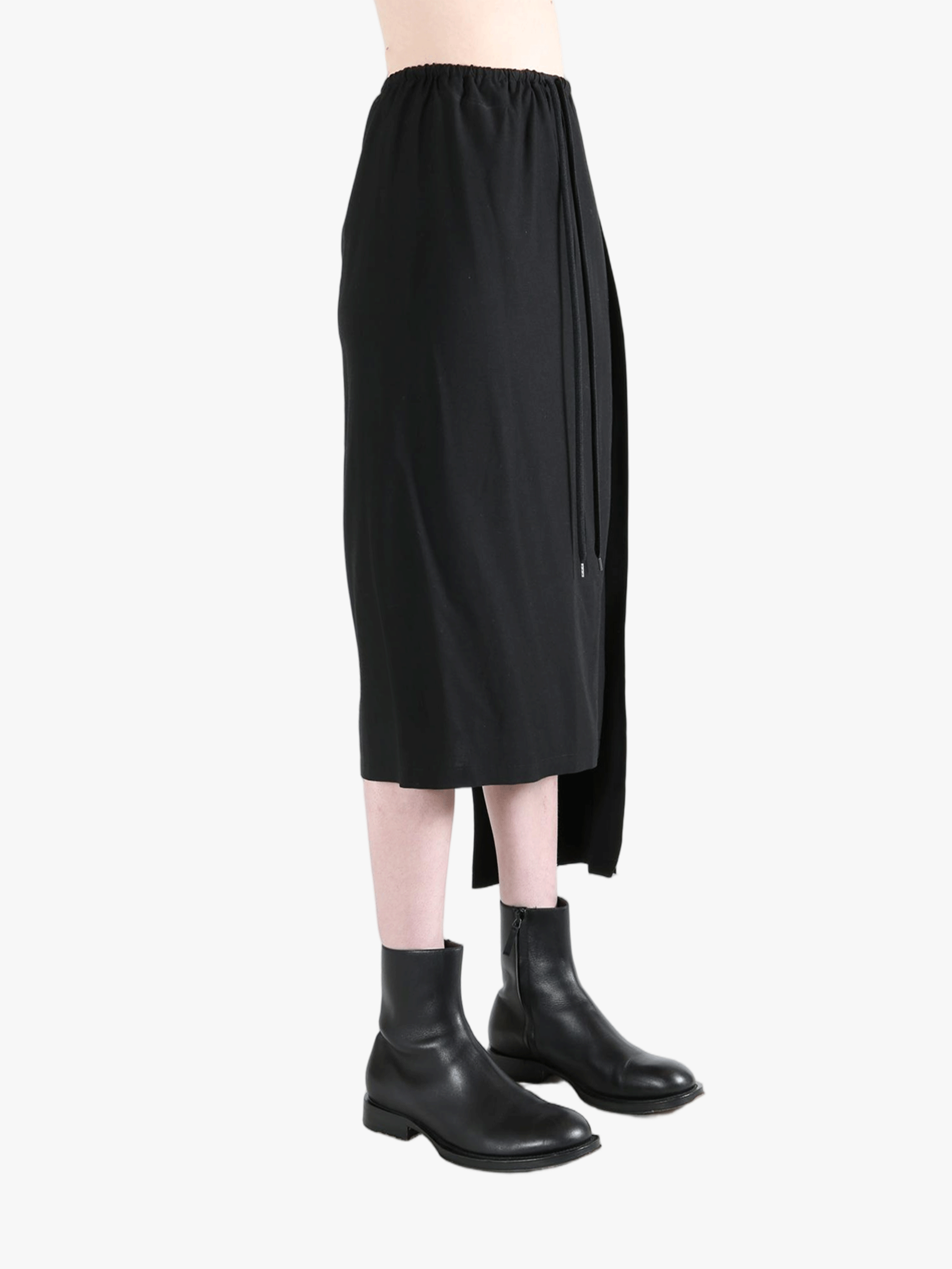 Black skirt worn by a person, showing the skirt fit