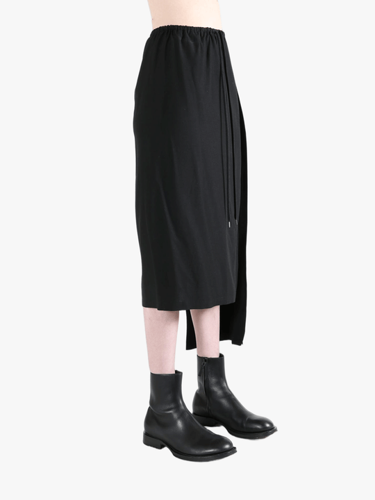 Black skirt worn by a person, showing the skirt fit