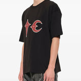 Black t-shirt worn by a person, showing the t-shirt fit