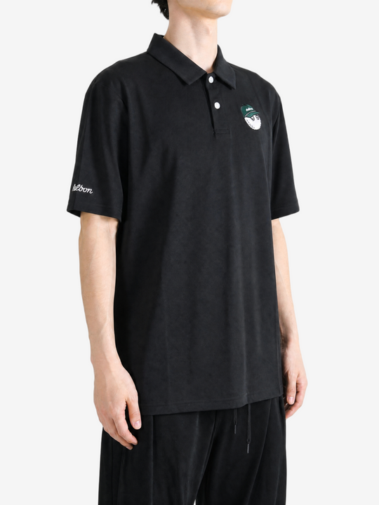 Black shirt worn by a person, showing the shirt fit