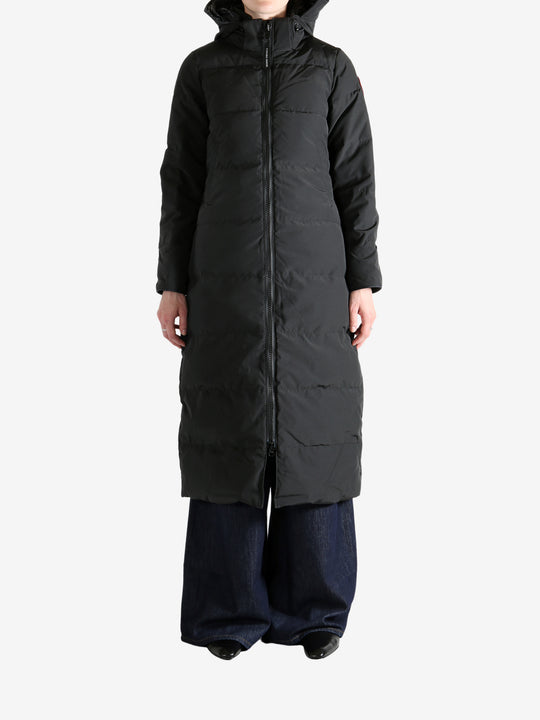 Black jacket worn by a person, showing the jacket's fit