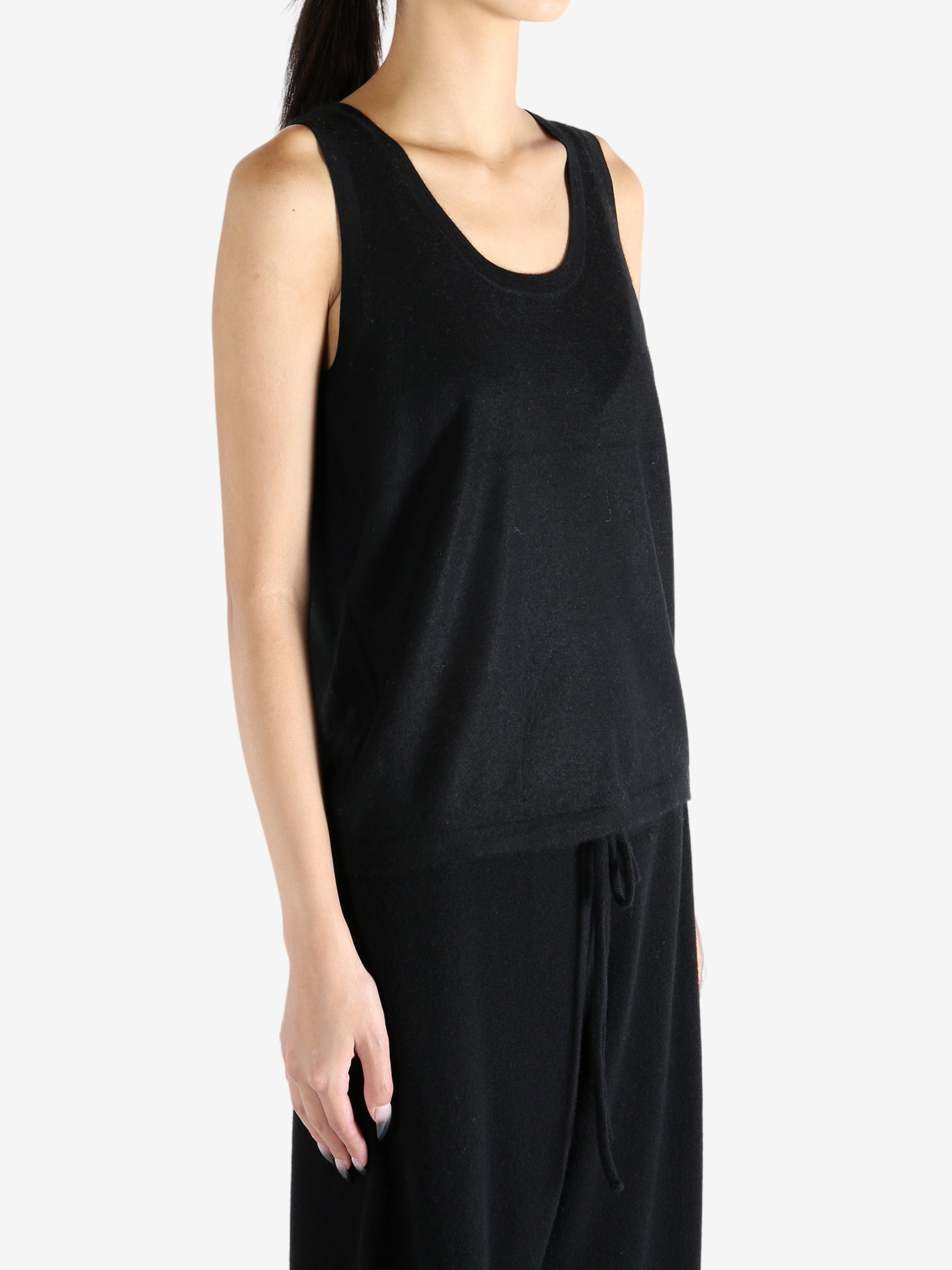 Black worn by a person, showing the top's fit