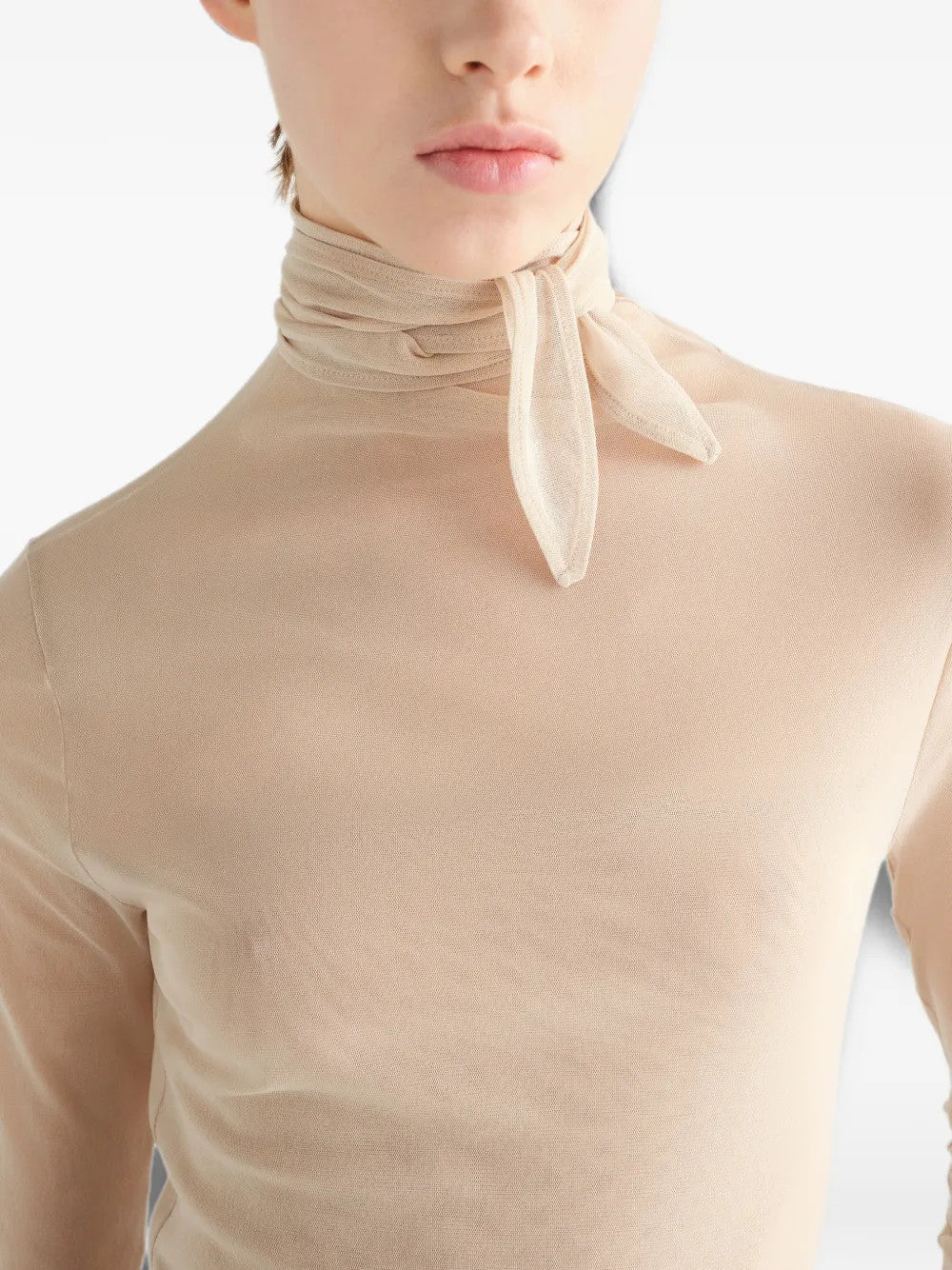 Tan top worn by a person, showing the top fit