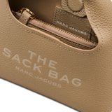 Close up of tan bags,showing texture of the leather fabric