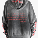 Black hoodie worn by a person, showing the hoodie fit