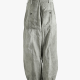 Gray wide-leg pants worn by a person, showing the pants fit