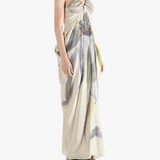 Tan dresses worn by a person, showing the dresses' fit