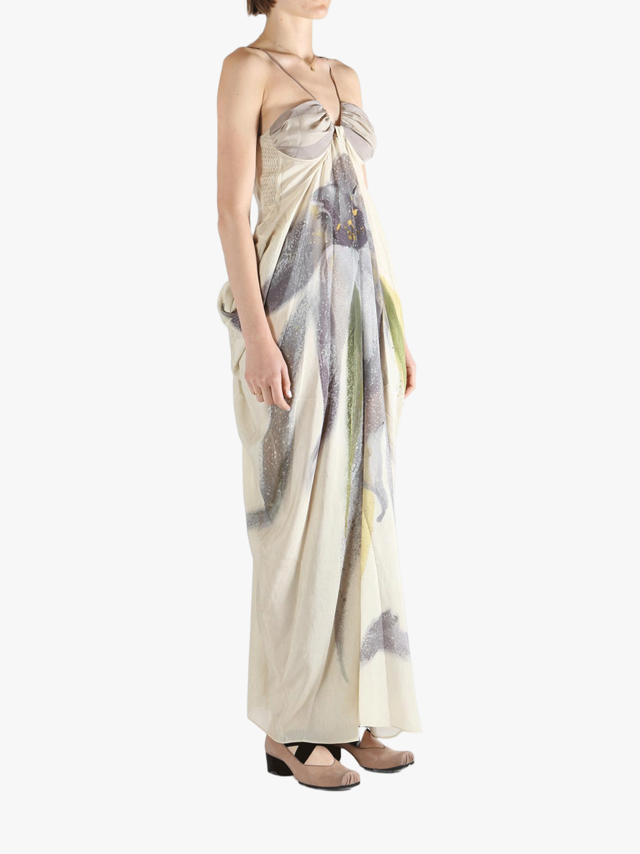 Tan dresses worn by a person, showing the dresses' fit