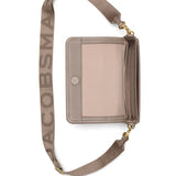 Close up of tan bags, showing texture of the cow leather fabric