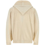 Tan blouson, back view