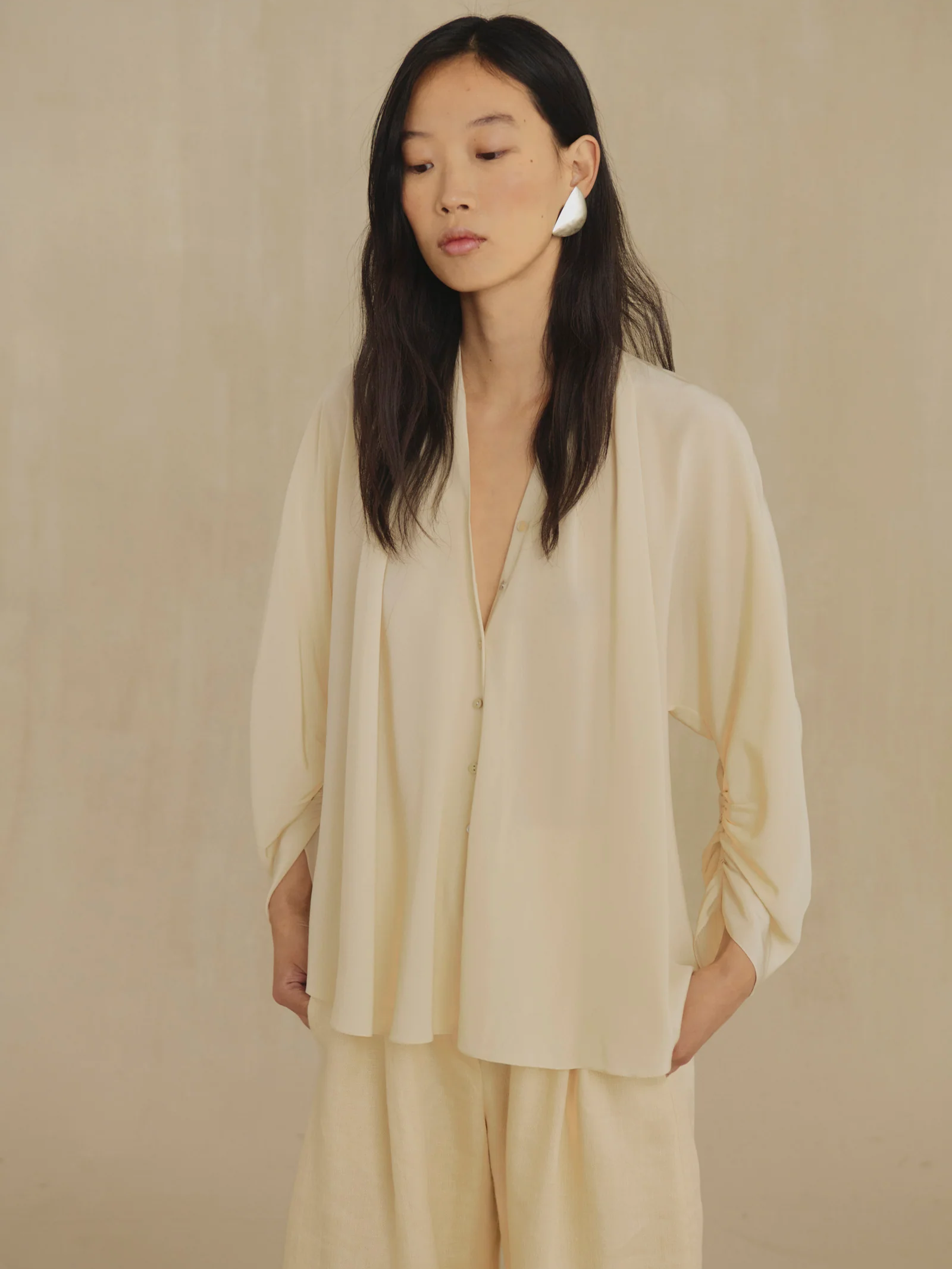 Tan shirt, full body view