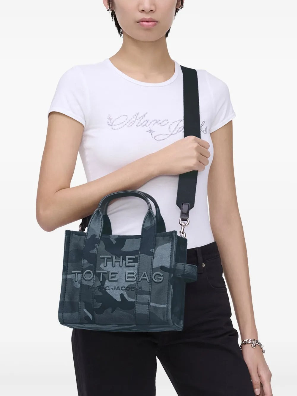 Blue bag worn by a person, showing the bag's fit