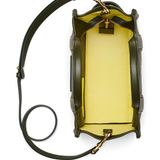 Close up of green bags, showing texture of the cow leather fabric