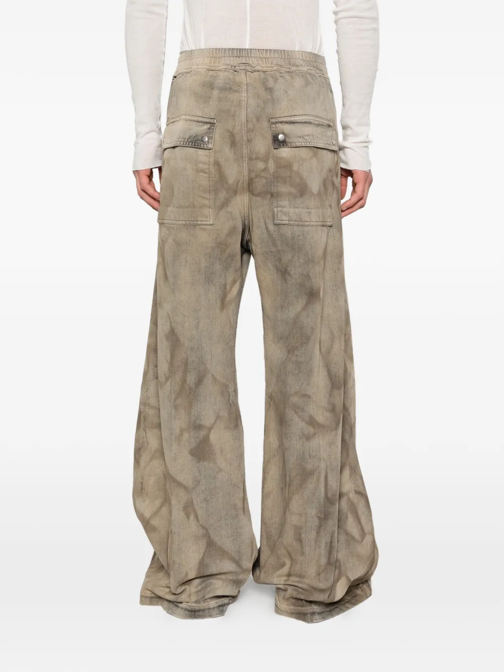 Tan pant worn by a person, showing the pant fit