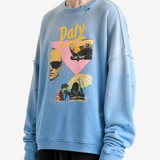 Blue hoodie worn by a person, showing the hoodie fit