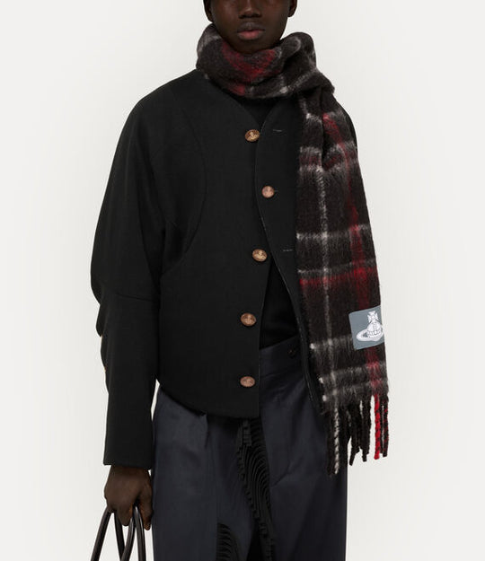 Black jacket worn by a person, showing the jacket fit